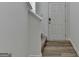 Bright home foyer featuring hardwood floors and a white door leading to the outside at 1659 Hay Patch Ln, Loganville, GA 30052