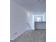 Bright and open loft space, ready for personalization with neutral colors and cozy carpeting at 1659 Hay Patch Ln, Loganville, GA 30052