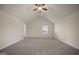 Spacious bedroom with vaulted ceilings, plush carpet, and natural light at 2376 Aukerman Trce, Hampton, GA 30228