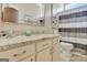 Bathroom with granite countertop vanity and decorative mirror and artwork at 221 Collierstown Way, Peachtree City, GA 30269