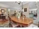 Spacious dining room with elegant wood table and decor at 221 Collierstown Way, Peachtree City, GA 30269