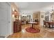 Open-concept living space with wood floors and classic decor at 221 Collierstown Way, Peachtree City, GA 30269