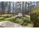 Spacious backyard with a large shed and surrounded by tall trees at 179 Green Valley Rd, Fayetteville, GA 30214