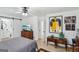 Bedroom boasts a sliding barn door to the bathroom and decorative displays on furniture at 179 Green Valley Rd, Fayetteville, GA 30214