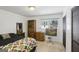 Bedroom features bright floors, a colorful quilt, and stylish decor at 179 Green Valley Rd, Fayetteville, GA 30214