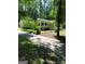 Home with a mature treeline, drive, and inviting front porch at 179 Green Valley Rd, Fayetteville, GA 30214