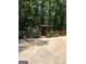 Gazebo in treed backyard with lush landscaping and plants at 179 Green Valley Rd, Fayetteville, GA 30214