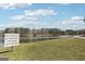Beautiful lake view with a 'No Trespassing' sign on the shore, indicating private property and restricted access at 179 Green Valley Rd, Fayetteville, GA 30214
