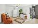 Additional space offering a refrigerator, dining space, and a cozy spot to relax near the entry at 179 Green Valley Rd, Fayetteville, GA 30214