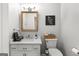 Charming bathroom with modern vanity, stylish mirror, and classic fixtures at 90 Oak Walk, Villa Rica, GA 30180