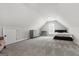 Upstairs bedroom with carpet flooring, and neutral-toned walls at 90 Oak Walk, Villa Rica, GA 30180