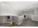 Upstairs bonus room is carpeted and has neutral-toned walls at 90 Oak Walk, Villa Rica, GA 30180