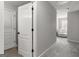 Upstairs hallway with carpet flooring and neutral-toned walls at 90 Oak Walk, Villa Rica, GA 30180