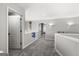 Upstairs hallway with carpet flooring and neutral-toned walls at 90 Oak Walk, Villa Rica, GA 30180