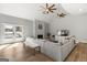 Bright living room with a stone fireplace, high ceilings, and French doors at 90 Oak Walk, Villa Rica, GA 30180