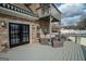 Inviting outdoor deck featuring comfortable seating and scenic backyard views, perfect for relaxing at 90 Oak Walk, Villa Rica, GA 30180