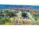 Scenic aerial of a suburban neighborhood featuring tree-lined streets and neatly arranged houses at 136 Glynn Addy Dr, Stockbridge, GA 30281