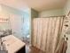 Bathroom with vanity, sink and walk in shower with sliding glass door at 136 Glynn Addy Dr, Stockbridge, GA 30281