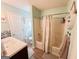 Well-lit bathroom features a shower over tub and neutral color scheme at 136 Glynn Addy Dr, Stockbridge, GA 30281