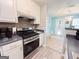 Updated kitchen featuring stainless steel appliances and modern white cabinetry at 136 Glynn Addy Dr, Stockbridge, GA 30281