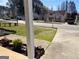 Residential street showcasing a tidy lawn, sidewalk, and a view of neighboring homes at 136 Glynn Addy Dr, Stockbridge, GA 30281