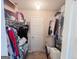 Bright walk-in closet with ample storage and shelving at 136 Glynn Addy Dr, Stockbridge, GA 30281