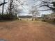 Spacious backyard with grass and a wooden fence at 1643 Columbia Dr, Decatur, GA 30032