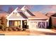 Charming craftsman-style home featuring a two-car garage, well-manicured lawn, and appealing architectural details at 2455 Westlington Cir, Cumming, GA 30040