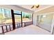 Screened porch with views to the backyard and a doorway to another part of the home at 2455 Westlington Cir, Cumming, GA 30040