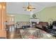 Inviting living room with fireplace and hardwood flooring at 105. Meadow Springs Ct, Locust Grove, GA 30248