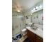 Bathroom with granite countertop, a vessel sink, walk-in shower, and nautical décor at 127 Circle H Rd, Sharpsburg, GA 30277