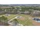 An aerial view of a gorgeous home and property in a rural setting surrounded by lush green trees and a massive lot at 196 Old Highway 92, Fayetteville, GA 30215