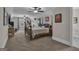 Large bedroom with ceiling fans, and carpeted floors, and room for a home gym at 196 Old Highway 92, Fayetteville, GA 30215