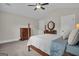 Spacious bedroom with a ceiling fan, carpet, and plenty of room for bedroom furniture at 196 Old Highway 92, Fayetteville, GA 30215