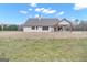 Lovely single-story home with a well-maintained lawn and a covered patio, perfect for outdoor living and entertaining at 196 Old Highway 92, Fayetteville, GA 30215