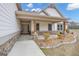 Welcoming front porch with stone accents and stylish lighting fixtures at 196 Old Highway 92, Fayetteville, GA 30215