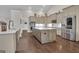 Bright kitchen with stone countertops, an island, and stainless appliances at 196 Old Highway 92, Fayetteville, GA 30215