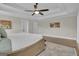 Bright bedroom with a large bed and hardwood floors throughout at 196 Old Highway 92, Fayetteville, GA 30215