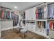 Spacious walk-in closet with custom shelving, drawers, and hanging rods for optimal organization at 196 Old Highway 92, Fayetteville, GA 30215