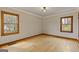 Bedroom featuring hardwood flooring, natural light and white walls at 1312 Milstead Ne Ave, Conyers, GA 30012