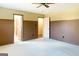 Carpeted bedroom with adjacent bathroom access and separate closet for efficient organization at 260 Brookwood Ln, Fayetteville, GA 30215