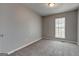 Bedroom with plush carpet and plenty of sunlight at 3911 Waldrop Ln, Decatur, GA 30034