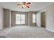 Large bedroom featuring plush carpet, two windows and walk in closet at 3911 Waldrop Ln, Decatur, GA 30034