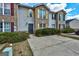 Attractive townhouse showcasing a combination of brick and siding, with charming yellow window shutters at 3911 Waldrop Ln, Decatur, GA 30034