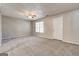 Generous living area with neutral walls, fan and carpet, flooded with natural light from the window at 3911 Waldrop Ln, Decatur, GA 30034