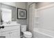 Cozy bathroom with a shower-tub combo, vanity, and a neutral color scheme at 337 Skylar Se Way, Atlanta, GA 30315