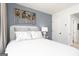 A nicely decorated bedroom features stylish wall art and a bright interior door at 337 Skylar Se Way, Atlanta, GA 30315