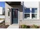Charming townhouse front entrance featuring a dark teal door and decorative number plate at 337 Skylar Se Way, Atlanta, GA 30315
