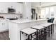 Well-lit kitchen showcasing stainless steel appliances and a large island with seating at 337 Skylar Se Way, Atlanta, GA 30315