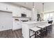 Bright and modern kitchen with white cabinets, stainless steel appliances, and a large island at 337 Skylar Se Way, Atlanta, GA 30315